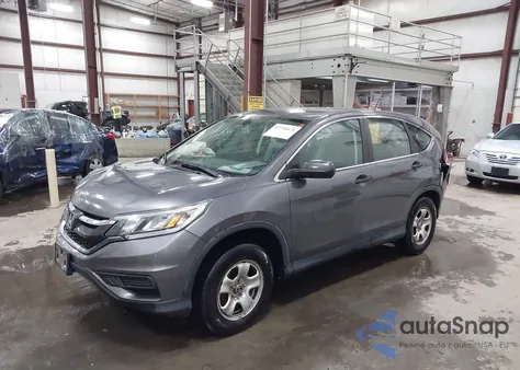 2015 Honda Cr-V Lx z USA, uszkodzony, nr VIN 2HKRM3H33FH504291